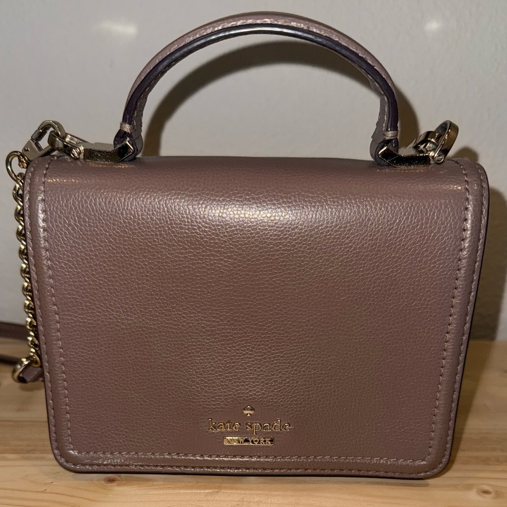 Kate Spade Mini Mauve Crossbody Bag with Chain Strap and Flap Closure